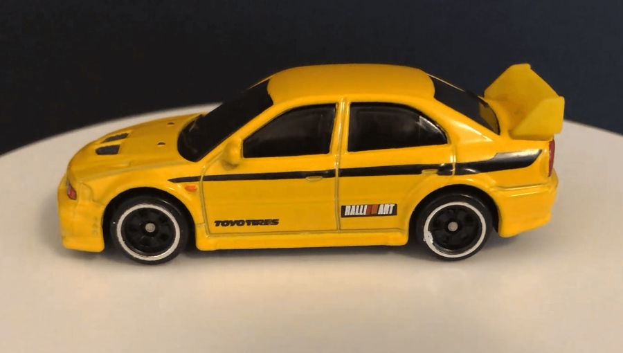 Тематична Машинка Hot Wheels Mitsubishi Lancer Evolution VI '90s Street Scene 1:64 JCB58 GDG44 Yellow